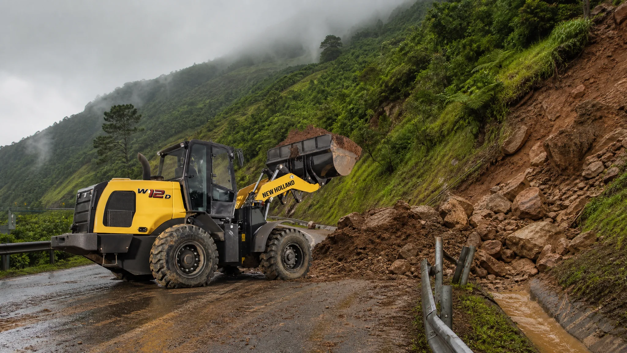 Cargadora frontal New Holland W12D — Mantenimiento vial